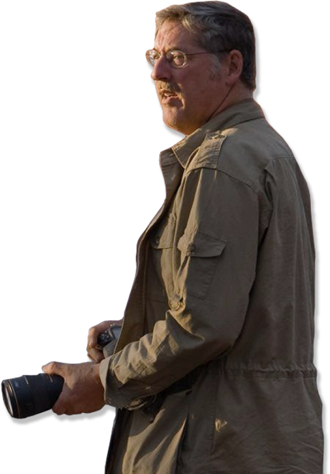 image of man taking great photo while on African safari for Wildlife photo book